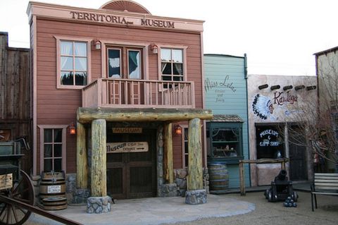 1991 Ford LTD Crown Victoria - A collection of themed buildings designed to look like a frontier town, complete with a museum and gift shop.