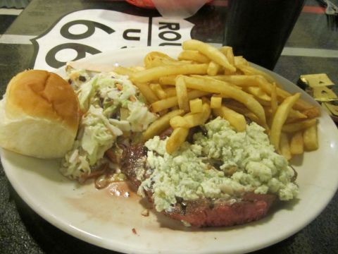 1991 Ford LTD Crown Victoria - A meal is served on a plate with a Route 66 sign visible in the background.