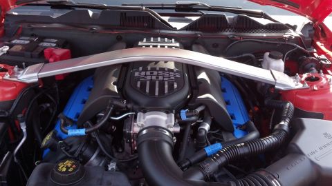 2007 Ford Mustang - Close-up of a Ford Mustang Boss 302 engine, showing the intake manifold and strut brace.