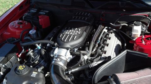 2007 Ford Mustang - Engine bay view of a Ford Mustang Boss 302, showing the intake manifold and other components.