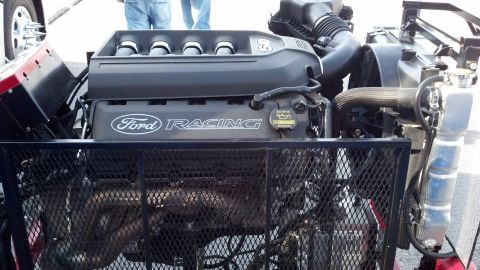 2007 Ford Mustang - The engine features a Ford Racing branded valve cover and a black air intake system.