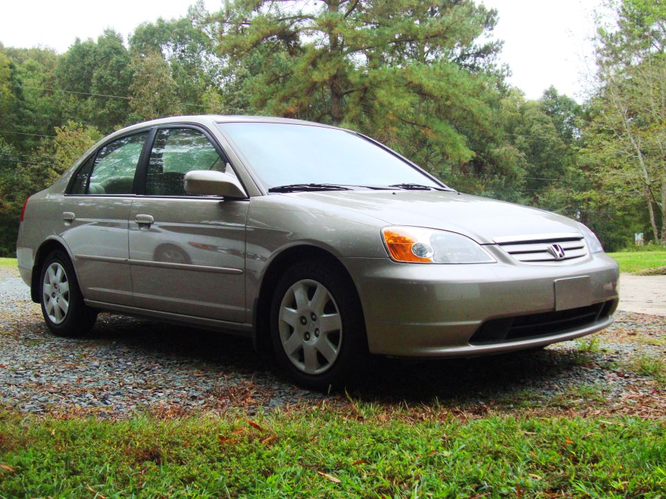 Tan 2001 Honda Civic sedan, 3/4 front view