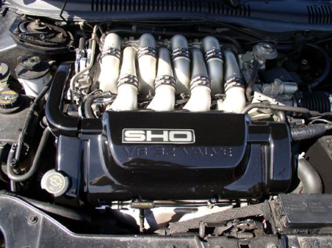 1998 Ford Taurus - Close-up of a Ford SHO V8 32 Valve engine, showing the intake manifold and cover.