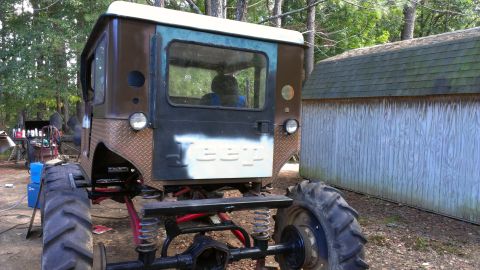 1978 Ford Bronco - This heavily modified Jeep CJ-5 features oversized tires and a unique paint scheme.