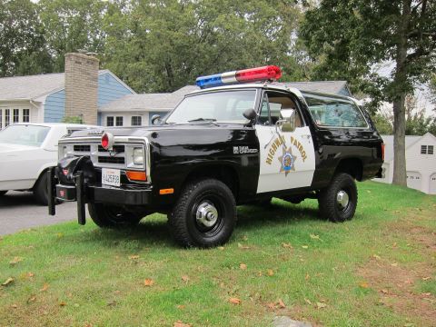 1987 Dodge 1500 - This 1987 Dodge Ramcharger SUV is outfitted as a police vehicle with a light bar and "Highway Patrol" markings.