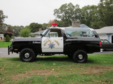 1987 Dodge 1500 - This Dodge Ramcharger is painted as a highway patrol vehicle, complete with a light bar and official markings.
