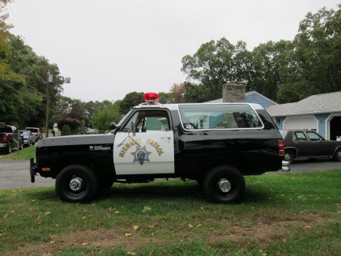1987 Dodge 1500 - This 1987 Dodge Ramcharger SUV is marked as highway patrol, a black and white paint scheme and emergency lights.