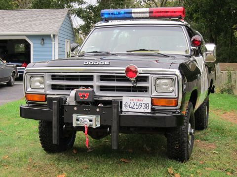 1987 Dodge 1500 - This Dodge Ram pickup truck is equipped as a police vehicle, a light bar and a front-mounted winch.