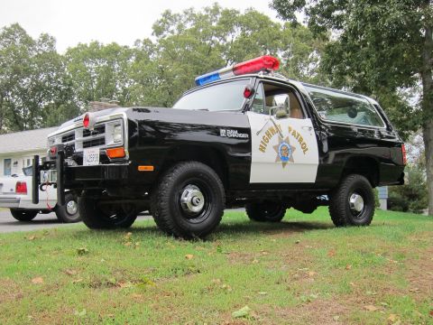 1987 Dodge 1500 - This 1987 Dodge Ramcharger is outfitted as a highway patrol vehicle, complete with a light bar and official markings.