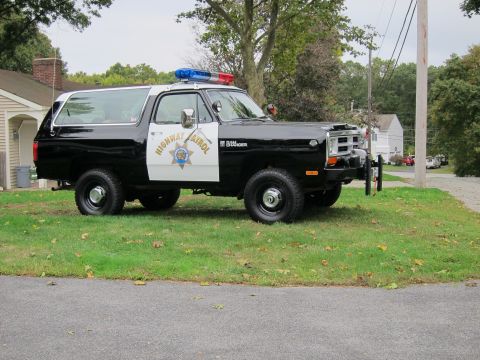 1987 Dodge 1500 - This Dodge Ramcharger is outfitted as a police vehicle with a light bar and official markings.