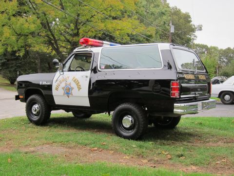 1987 Dodge 1500 - This Dodge Ramcharger is marked as a highway patrol vehicle, complete with a light bar and official markings.