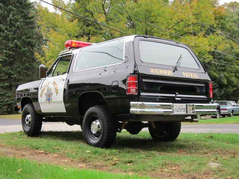1987 Dodge 1500 - Rear view of a black 1987 Dodge Ramcharger modified as a highway patrol vehicle.