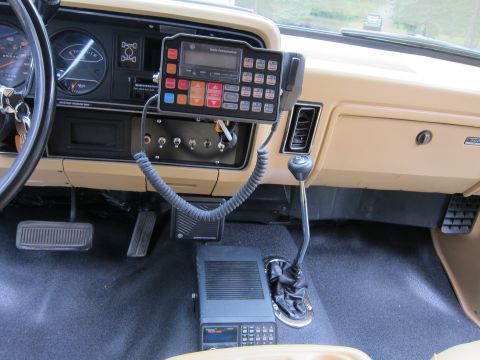 1987 Dodge 1500 - Interior view of a 1987 Dodge 1500, a CB radio and manual transmission shifter.