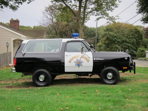 1987 Dodge 1500 - This 1987 Dodge Ramcharger is marked for Highway Patrol duty, its distinctive black and white livery and emergency light bar.
