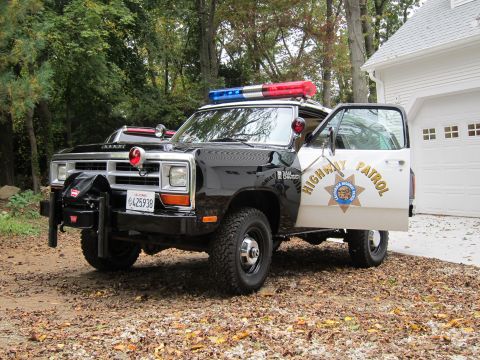 1987 Dodge 1500 - This 1987 Dodge Ram pickup truck is outfitted as a Highway Patrol vehicle, complete with a light bar and official markings.