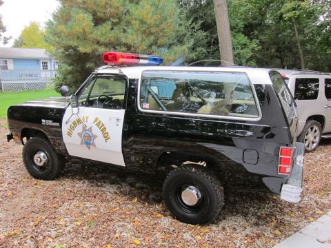 1987 Dodge 1500 - This Dodge Ramcharger is outfitted as a highway patrol vehicle, complete with a light bar and official markings.