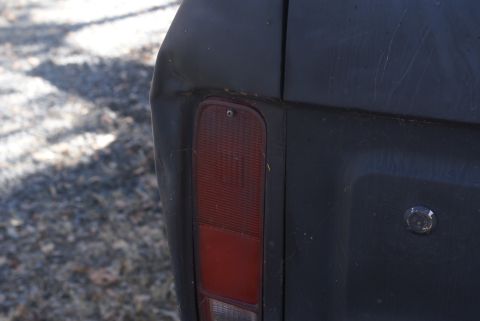 1978 Ford Bronco - Close-up of the rear taillight and body panel on a 1978 Ford Bronco.