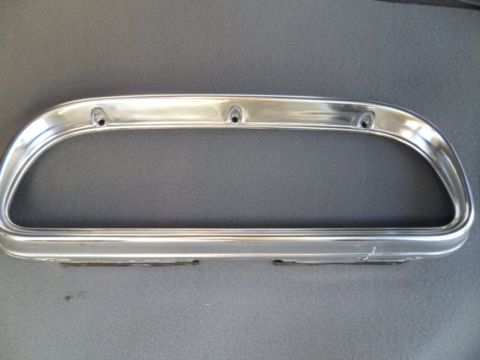1994 Jeep Cherokee - This is a chrome bezel for a vehicle's instrument cluster, with visible mounting holes.