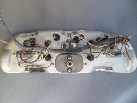 1994 Jeep Cherokee - The rear of a vehicle's dashboard assembly, showing a complex network of wires and electrical connections.