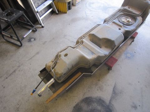 2008 Jeep Wrangler - A vehicle fuel tank assembly is shown, likely removed for service or replacement.