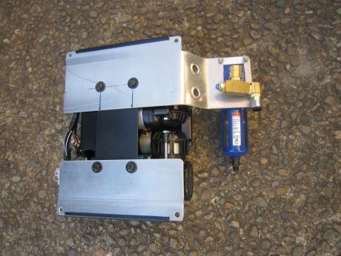 2008 Jeep Wrangler - Air compressor unit with blue filter and brass fittings mounted on aluminum plates.