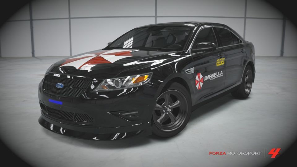 Black sedan with Umbrella Corporation logos on hood and doors