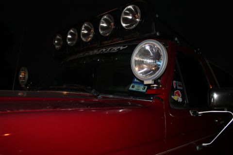 1990 Ford Bronco - 1990 Ford Bronco with auxiliary lights mounted on the roof and A-pillar.