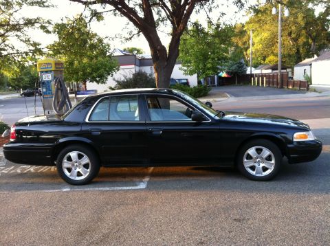 2005 Ford Crown Victoria - traded my extra set of 06 rims and covers, for this set of 2011 LX rims.