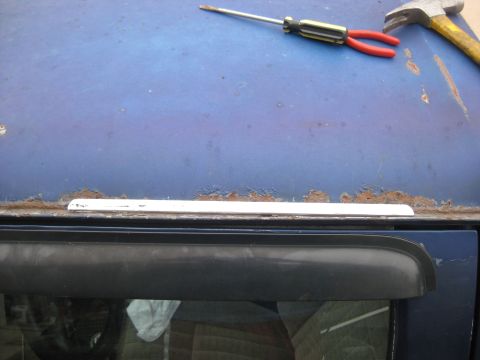 1994 Ford Bronco - I found this piece of scrap metal to use as a patch.