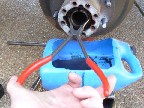 1997 Chevrolet Silverado 3500 - Rather than fight the spanner, I just used these. There's only ~13 lb-ft of torque on the nut anyway.