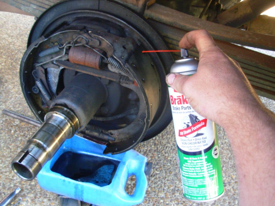 I didn't ride the oily brakes long enough to damage the shoes - they're coming clean with just a rinse.