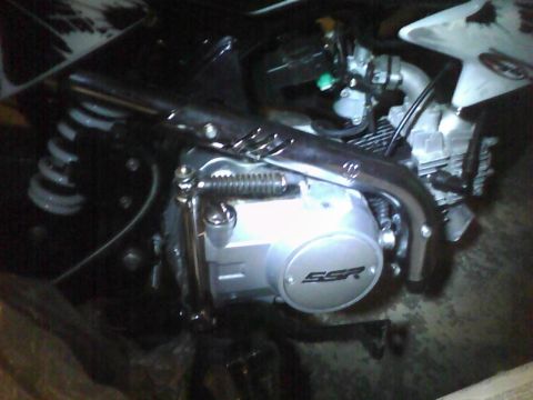 2003 Ford Crown Victoria - The engine of a motorcycle, an SSR logo on its casing.