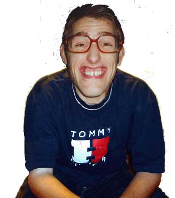 1994 Ford Crown Victoria - A man with a humorous expression and glasses is pictured wearing a dark t-shirt.