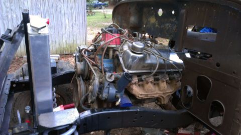 1978 Ford Bronco - Engine and radiator assembly in a vehicle frame, likely undergoing restoration or modification.