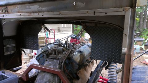 1978 Ford Bronco - Close-up view of engine and chassis components during a vehicle repair project.