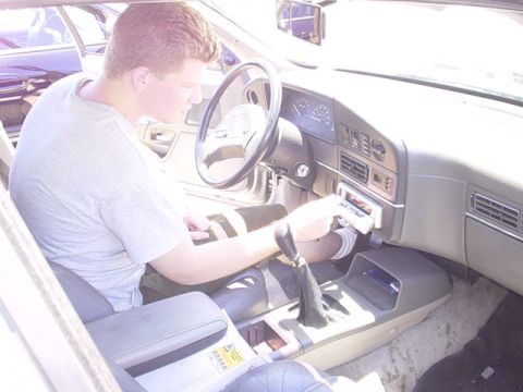 2002 Ford Taurus - Let's see now....that seat ejector button is here somewhere.....
