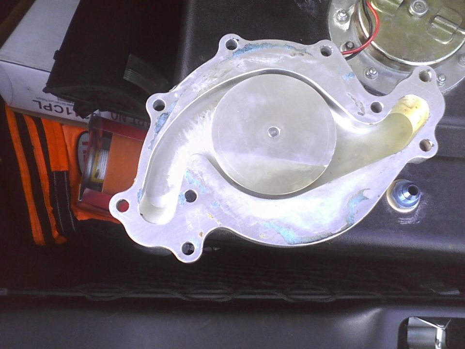 Water pump with visible impeller and mounting holes