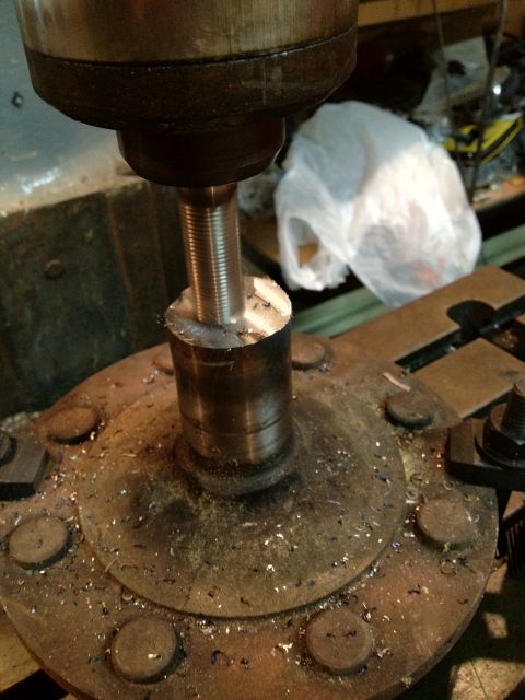 1989 Ford Bronco - Machining a metal part on a drill press.
