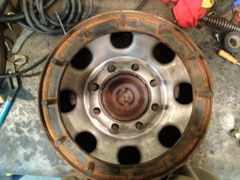1989 Ford Bronco - A close-up view of a heavily rusted wheel hub, likely from a truck or heavy equipment.