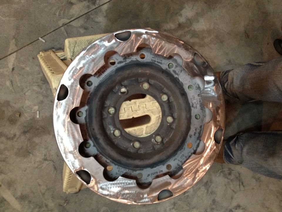 Wheel hub assembly with multiple bolt holes and some text stamped on it