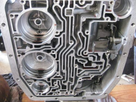 1994 Ford Bronco - That black stuff is burnt clutch material. It can cause all sorts of problems so the first step is to clean it off.