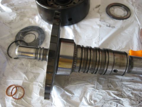 1994 Ford Bronco - All the seals are removed. To remove the metal seals pull the ends apart and slide them carefully off the shaft. In this pic the one farthe…