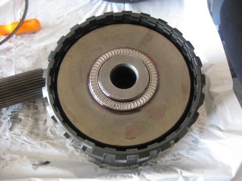 1994 Ford Bronco - The direct drive clutches and output shaft are assembled as one unit before installation. The direct drive drum is placed face down in the…