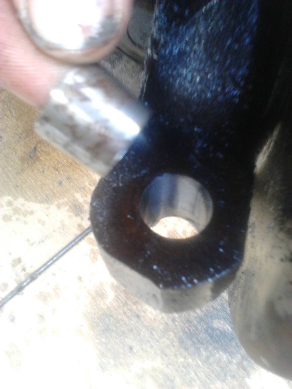 The hole after reaming and putting in the conversion sleeve.