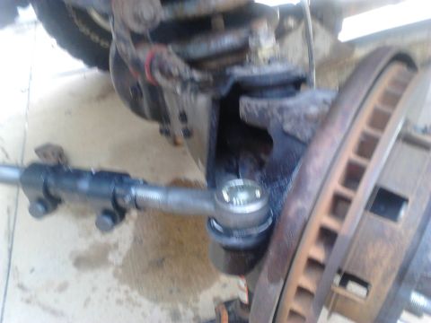 1996 Ford Bronco - Put the Tie Rod End in and tighten the nut and put the cotter pin in.