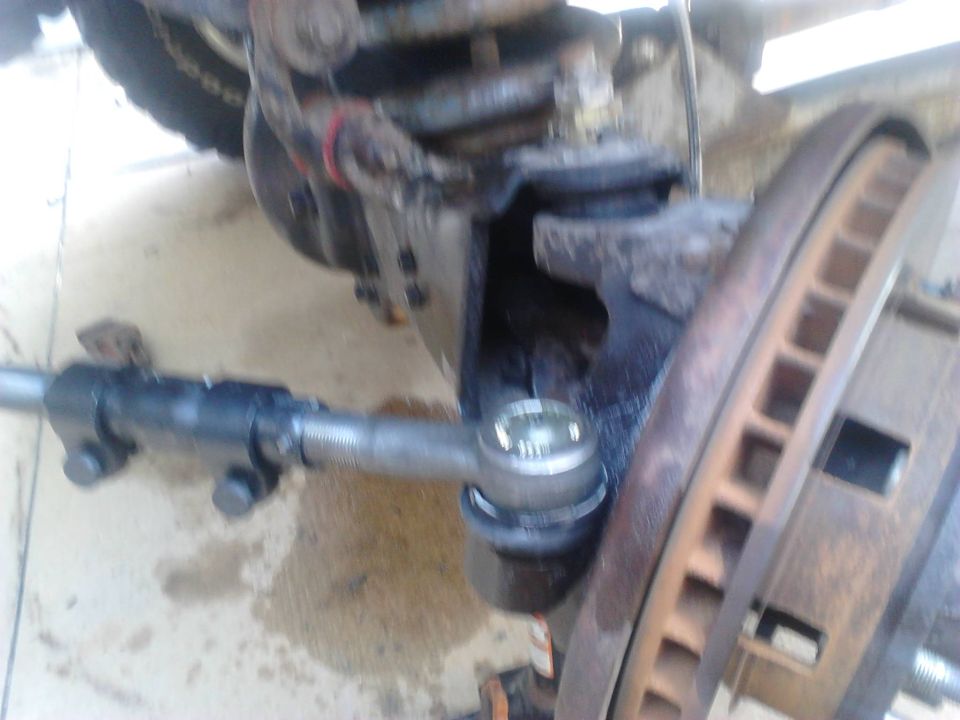Put the Tie Rod End in and tighten the nut and put the cotter pin in.