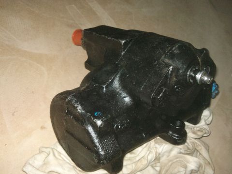 1998 Ford Crown Victoria - This is a steering gear box, likely a replacement part, shown resting on a cloth.