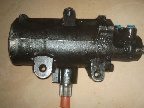 1998 Ford Crown Victoria - A close-up view of a black steering gear box, likely a replacement part.