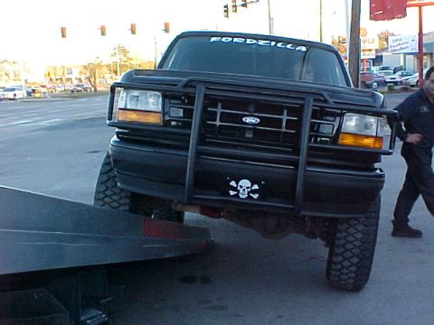 1995 Ford Bronco - This 1995 Ford Bronco features a prominent bull bar and a "FORDIZILLA" decal on the windshield.