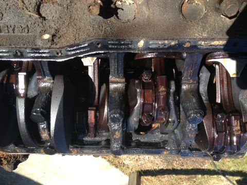1987 Ford Ranger - Close-up view of the internal components of an engine, including the crankshaft and connecting rods.